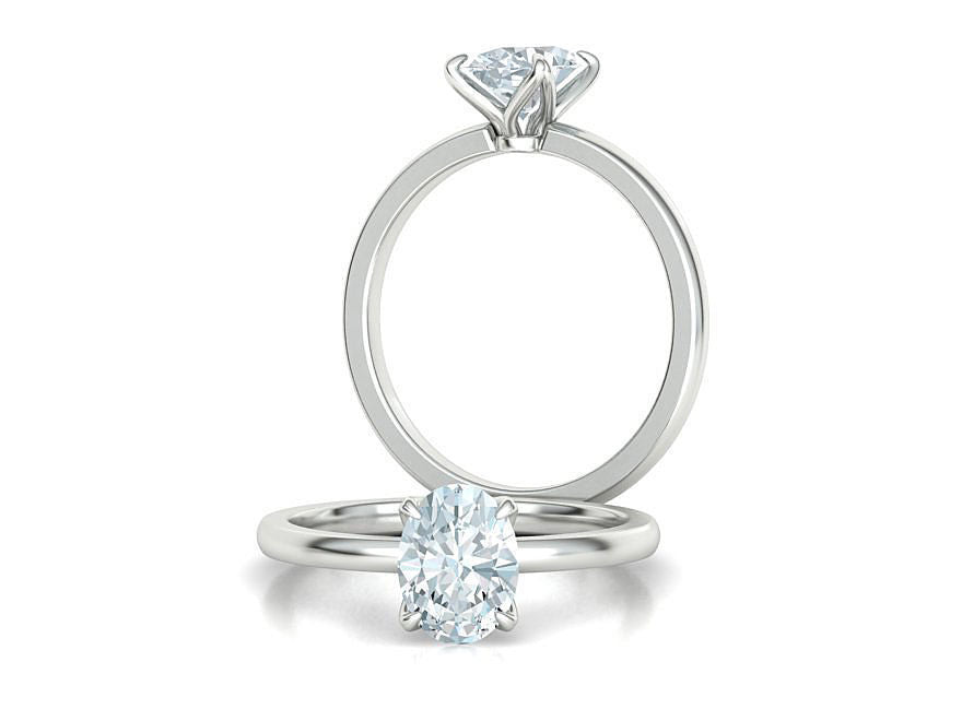 Elegante Anillo Solitario con Incrustación de Corte Oval