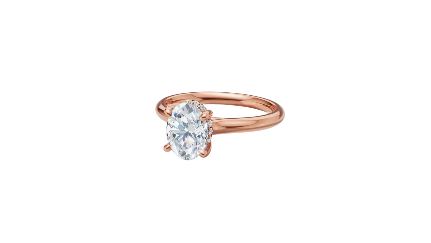 Anillo de Compromiso con Incrustación Oval y Halo Oculto
