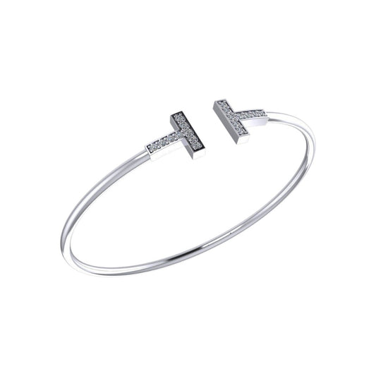 Ostentoso Brazalete Tiffany T de Oro Acompañado de Incrustaciones
