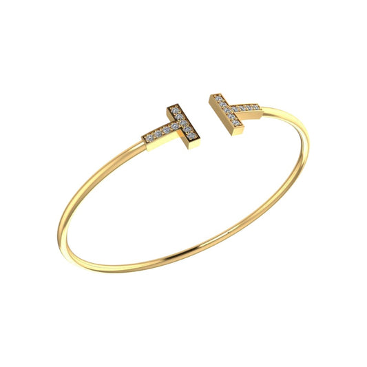 Ostentoso Brazalete Tiffany T de Oro Acompañado de Incrustaciones