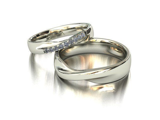 Elegante Duo de Argollas Matrimoniales con Incrustaciones